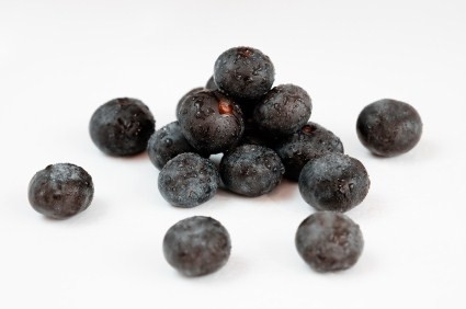 A selection of Acai berries on a white background.