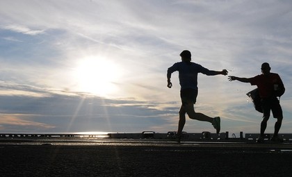 Two people running in the early morning.
