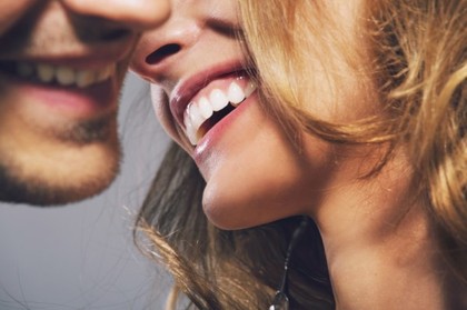 A close up shot of a happy couple.