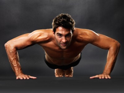 A man performing a press up.