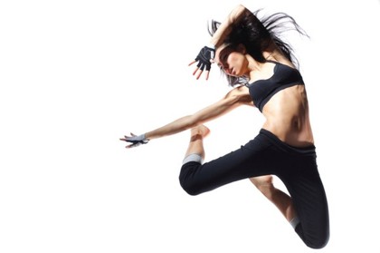 A female dancer jumping in the air.