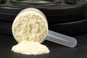 A scoop of whey protein powder.
