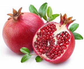 A whole and half pomegranate.