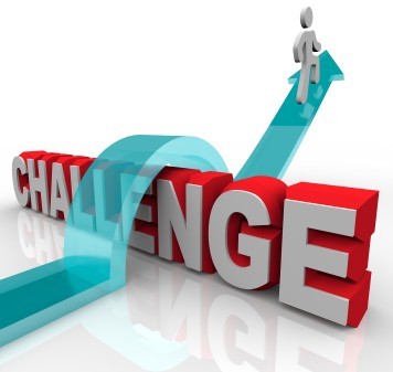 A stick man jumping over the word "challenge".