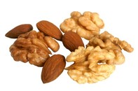 A selection of walnuts and almonds.