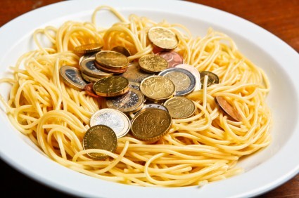 A plate of spaghetti and money.