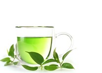 A glass cup of green tea.