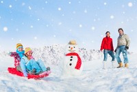 A family exercising in the winter weather.