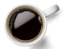 A cup of black coffee.