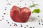 A piece of beef cut into a heart shape.