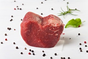 A piece of beef cut into a heart shape.