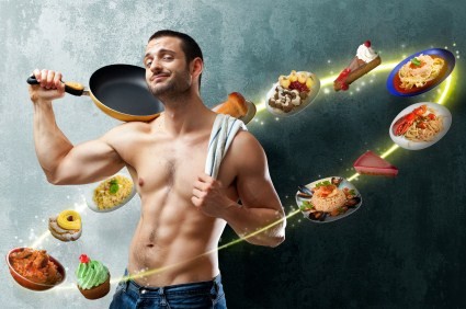 A man with toned abs and a frying pan surrounded by food.