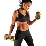 A woman lifting dumbbells.