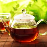 A glass pot of black tea.
