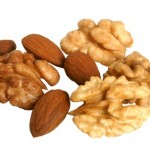 A selection of walnuts and almonds.