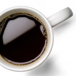 A cup of black coffee.