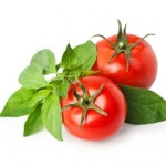 2 tomatoes on a white background.