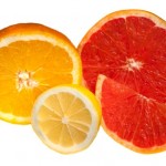 A sliced grapefruit and orange.