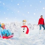 A family exercising in the winter weather.