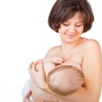 A mother breastfeeding her baby.
