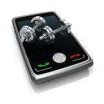 A mobile phone with dumbbells on the screen.